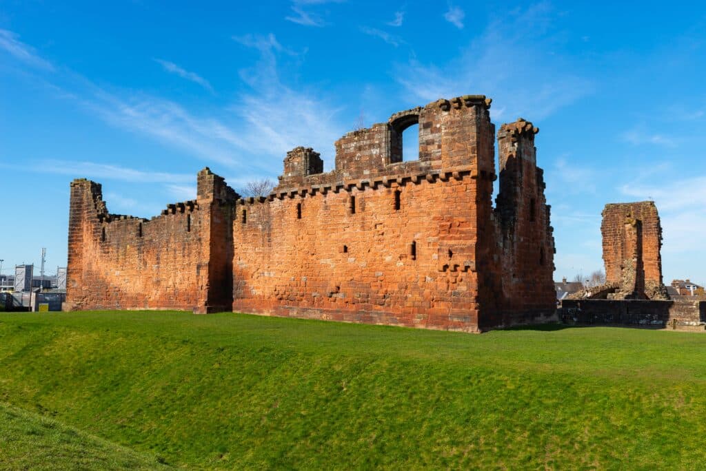 Exterior walls of the historic Penrith Castle in Northern England on a beautiful Spring morning. Penrith, England.