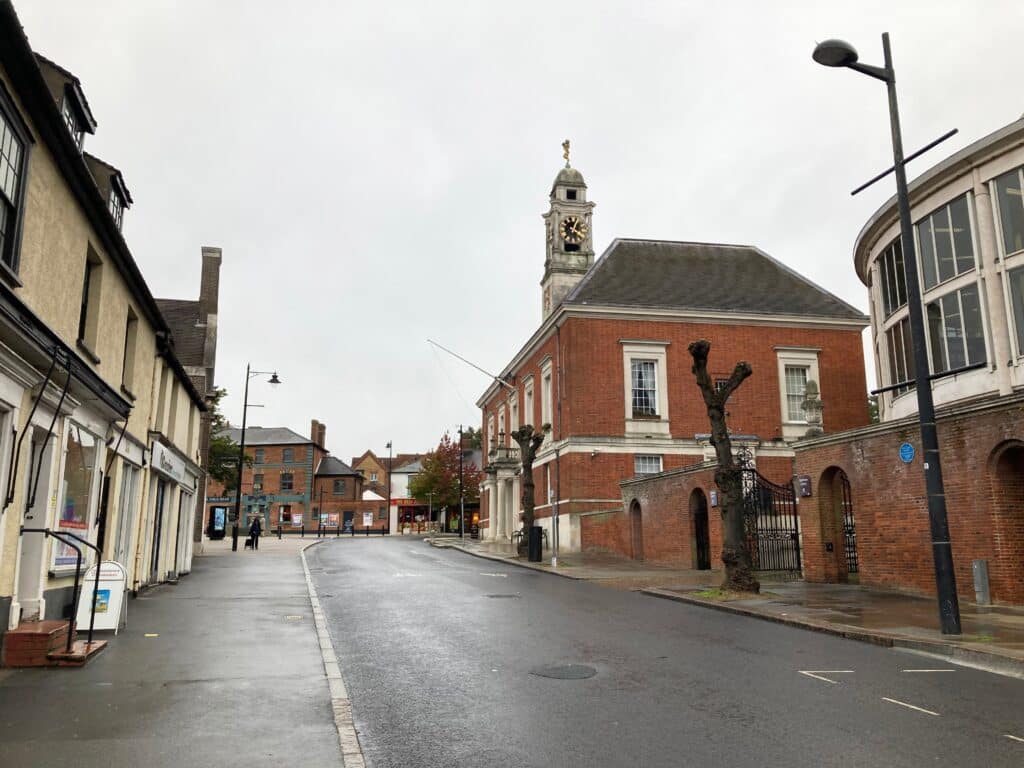 A street view of Fairfield Road leading to the marketplace in the market town of Braintree, accentuated by the turret of the Town Hall building