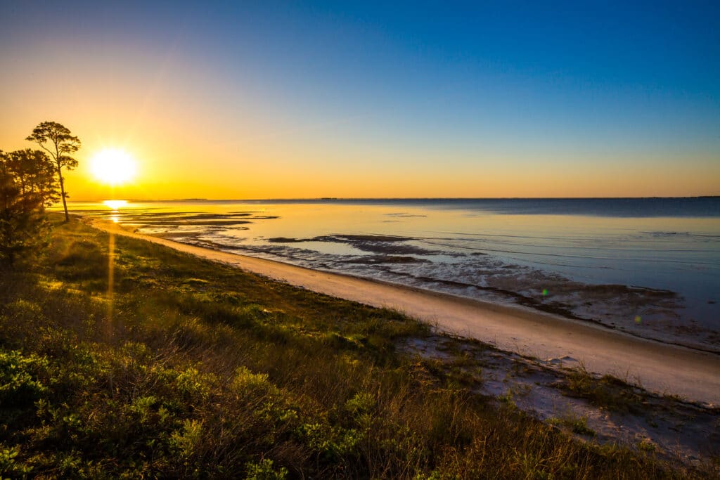 Sunrise over beach by Apalachicola, FL