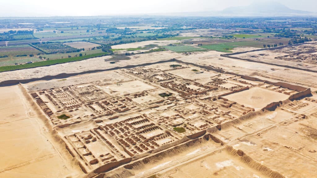 Aerial view of ancient ruins of Chan Chan in Trujillo, Peru. Archaeological site of ancient city from the Chimu culture belonging to the pre-Columbian era.