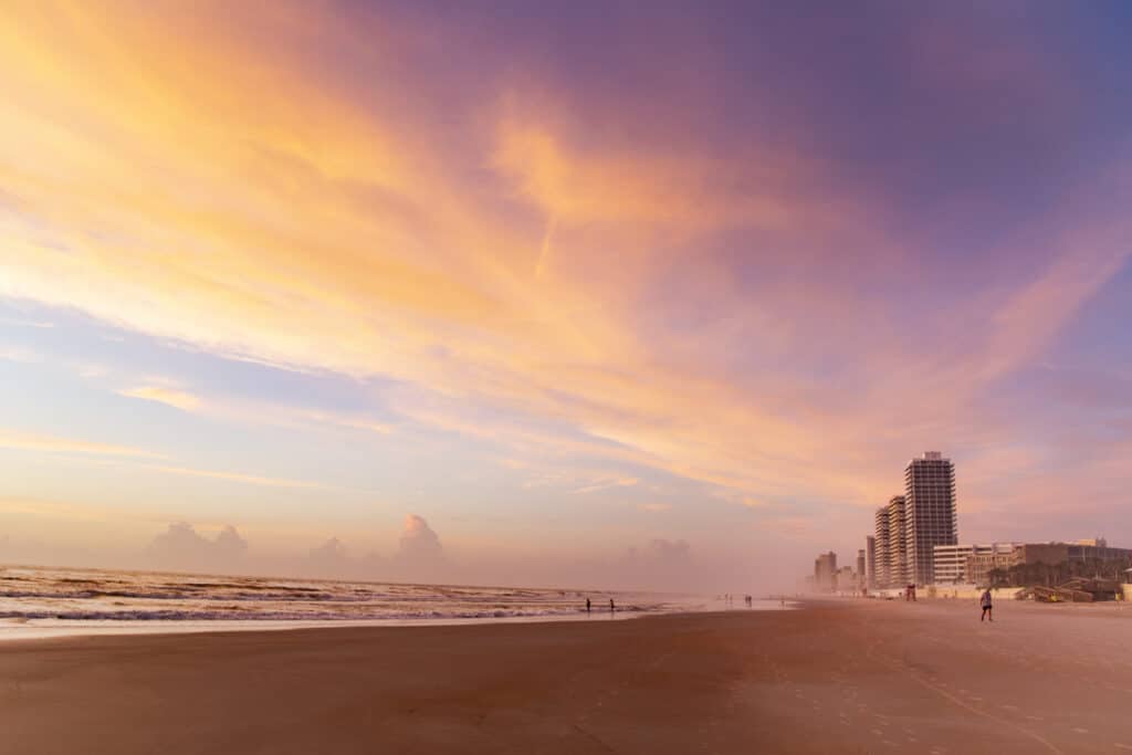 A beach and sunset in Daytona Beach, Florida