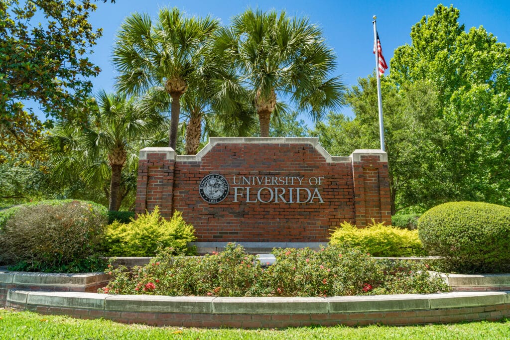 Gainesville, Florida / USA: The brick sign of University of Florida (UF) at the intersection of Museum road and SW 13th street.