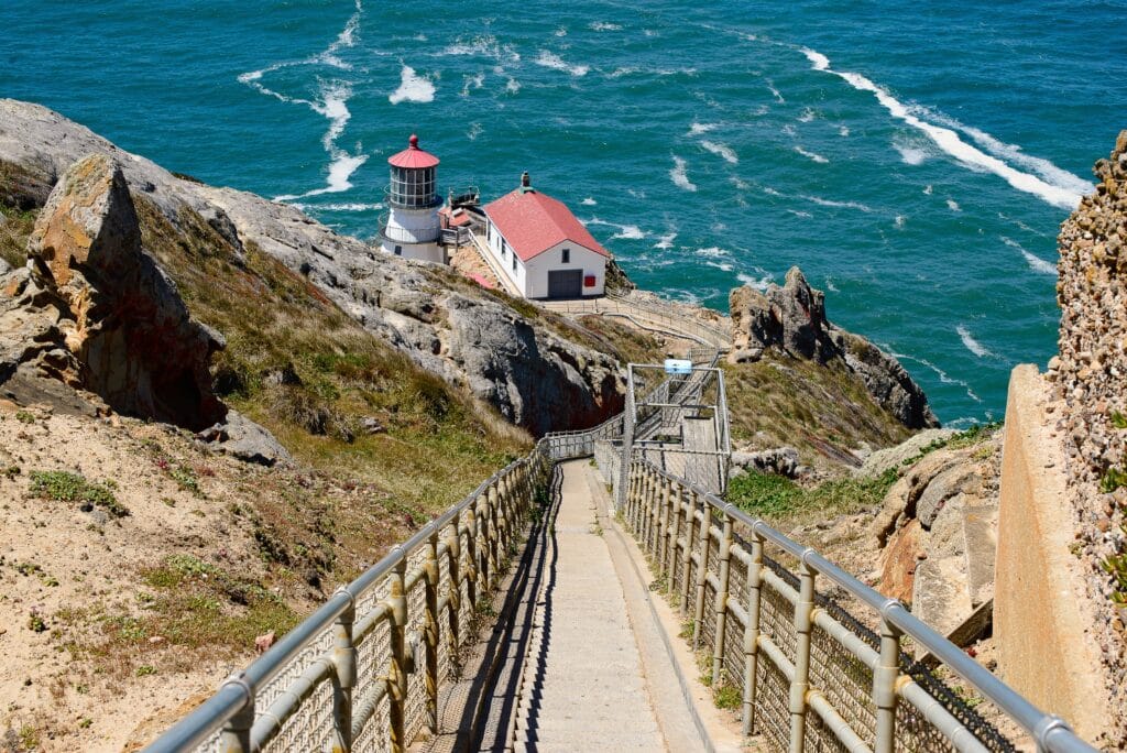 Point Reyes Lighthouse on the Pacific Ocean in the Point Reyes National Park on the Pacific Ocean crashing blue waves