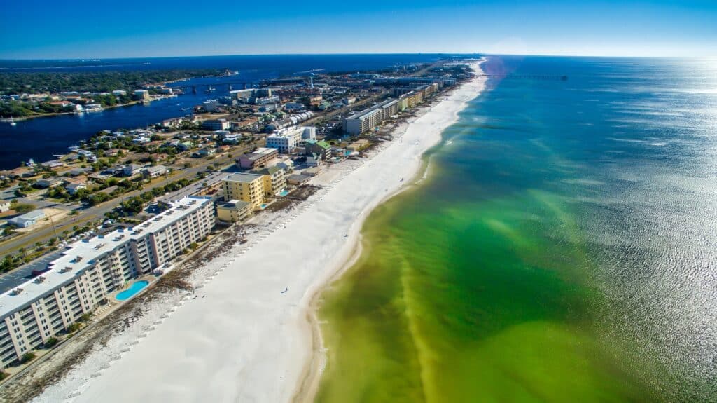 Fort Walton, Florida - Panoramic aerial view of cityscape and beach.