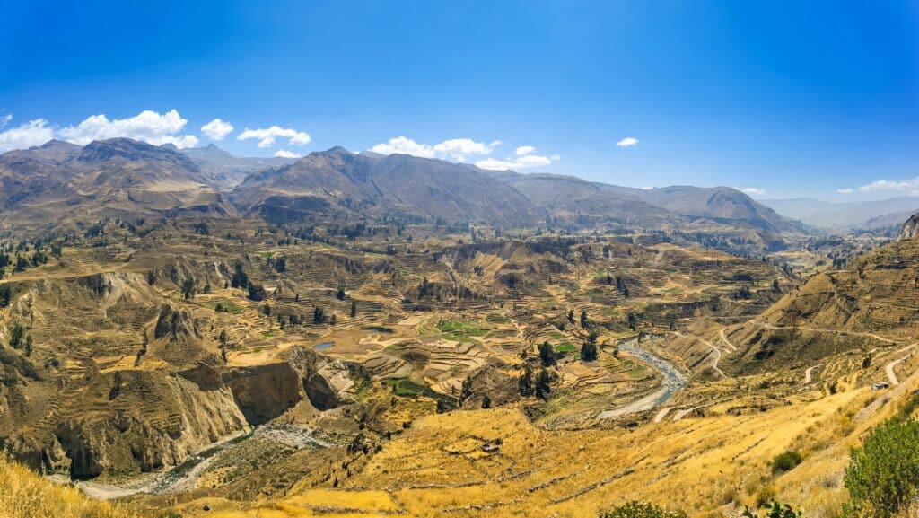 Panorama of Colca Canyon terraces dating to pre-Inca and pre-Columbian times from the Mirador Antahuilque viewpoint near Arequipa Peru