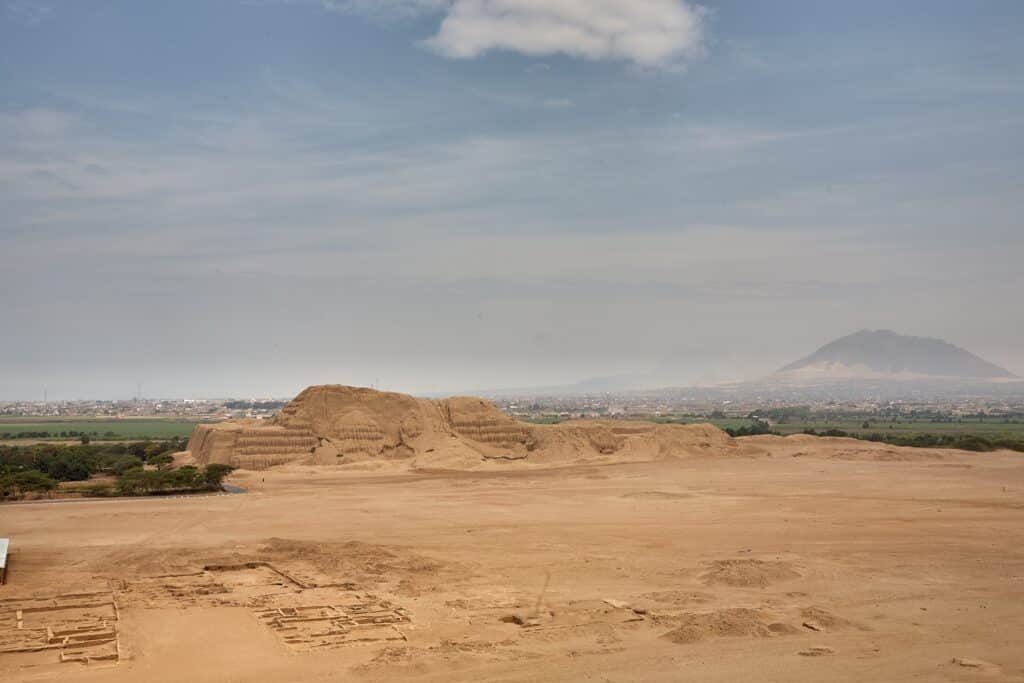 The Huaca del Sol, once the political heart of the Moche civilization, rises proudly from Trujillo's arid landscape. Built from millions of adobe bricks over 1,500 years ago