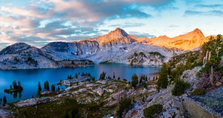 Sunrise Illuminates a Panorama of Glacier Peak, Eagle Cap Mountain, and Glacier Lake. 
Wallowa Mountains, Town of Joseph, Oregon.