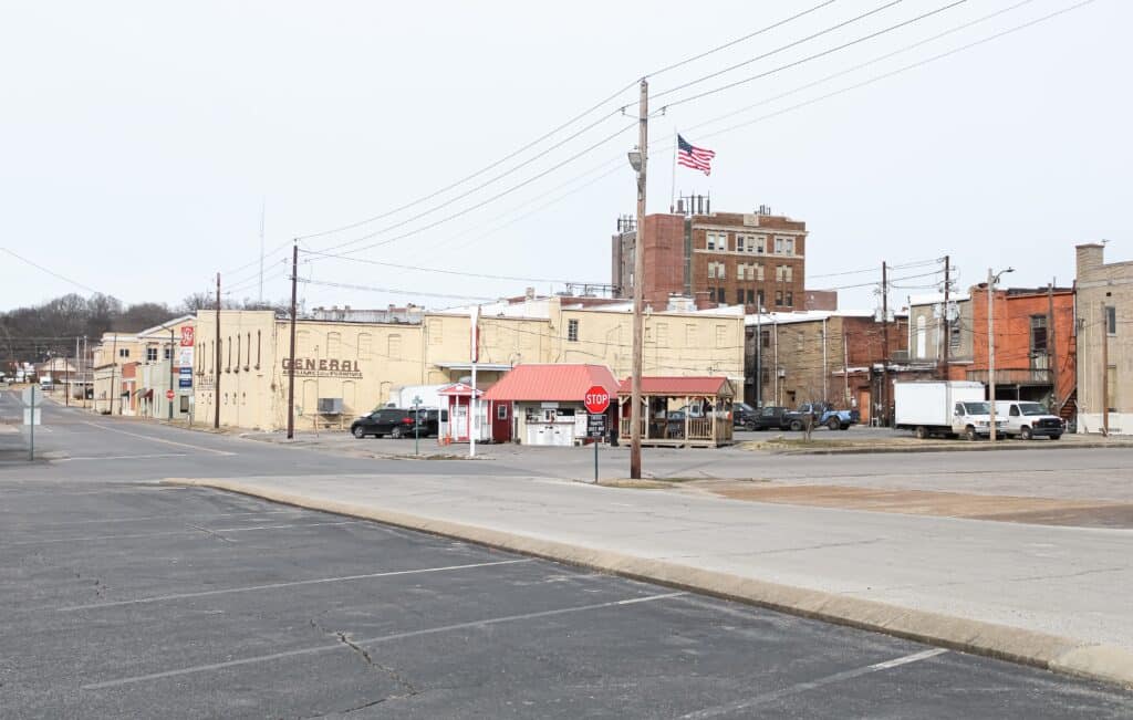 Dyersburg, Tennessee United States: the townscape with a flag on a rooftop