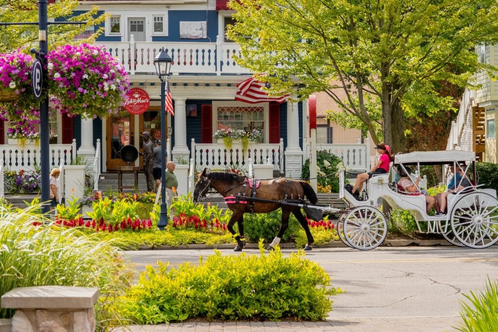 Frankenmuth Michigan, United States. A horse drawn carriage transports tourists in downtown Frankenmuth Michigan