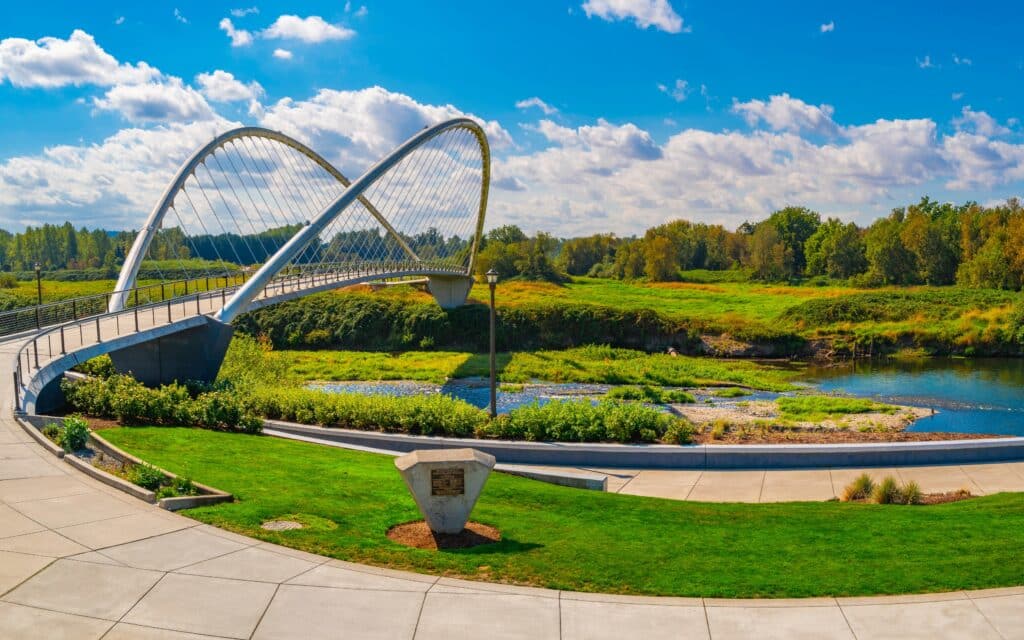 The Riverfront City Park landscape with Peter Courtney Minto Island Bridge over Willamette River in Salem, Oregon