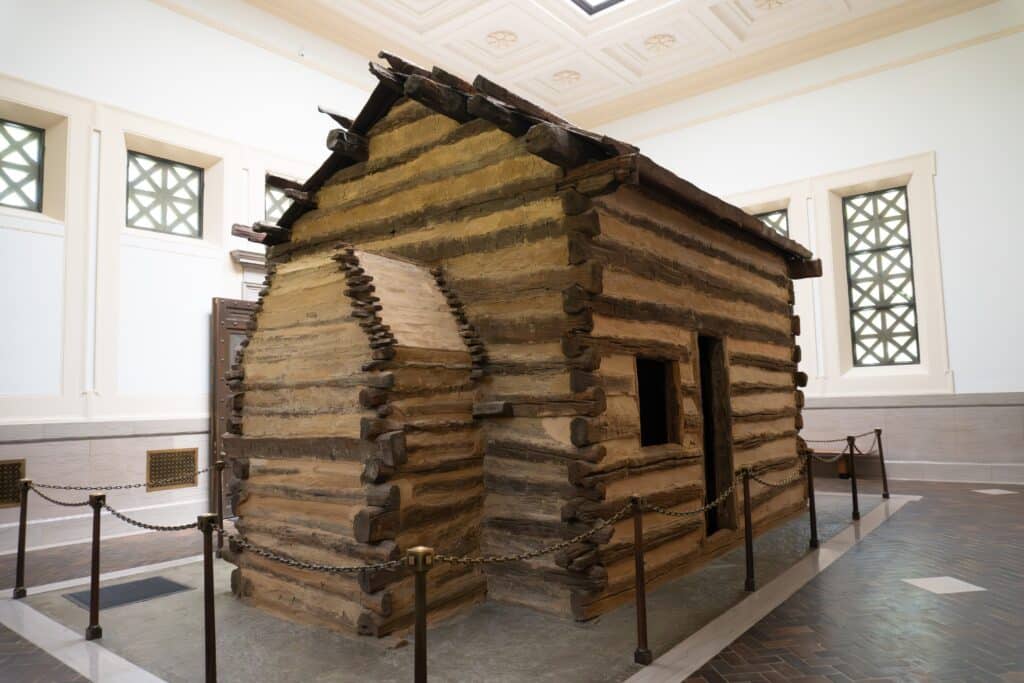 Hodgenville, Kentucky: Abraham Lincoln Birthplace National Historical Park. Symbolic log cabin in memorial building.