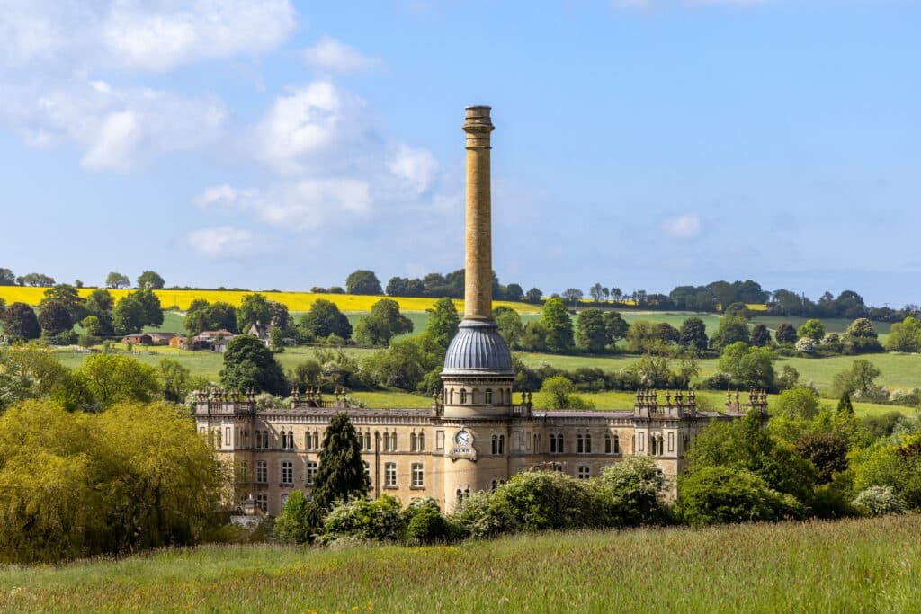 Chipping Norton, Oxfordshire, UK. Late 19th century factory having an unusual domed based chimney. The Mill finally closed in 1980 and has now been converted to luxury apartments.