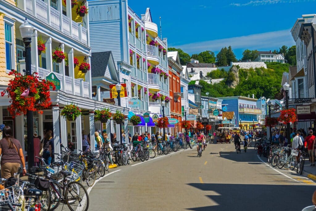 Crowded street view of Mackinaw Island Michigan during the busy tourist season