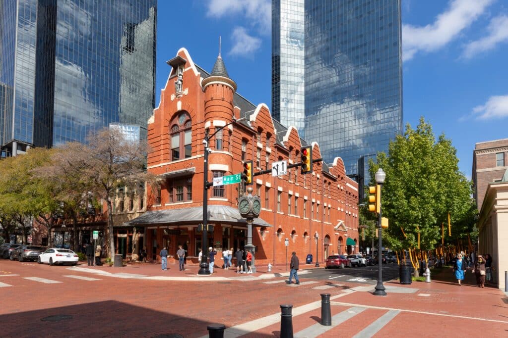 Fort Worth, Texas: Wells Fargo tower and historic bar and living house in Fort Worth at Main street.