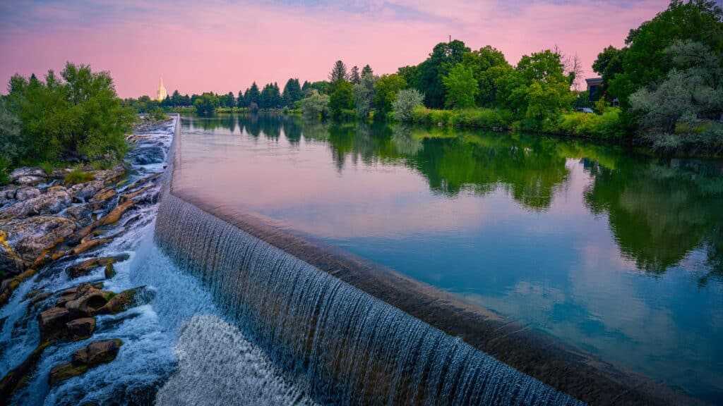 The Heart of Idaho Falls over the Snake River Waterfront in Bonneville County, Idaho, USA: The beauty of the waterfalls flowing through the center of town