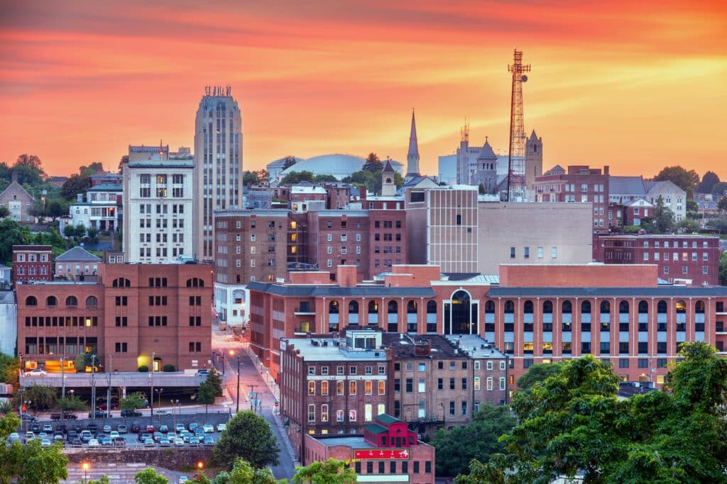 Lynchburg, Virginia, USA downtown city skyline at dusk.