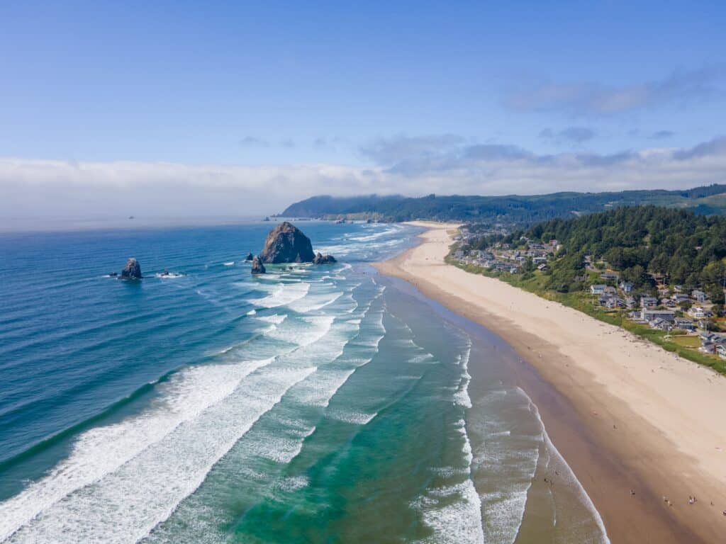 Aerial landscape of Haystack Rock formation on Cannon Beach Oregon Coast Pacific Northwest USA