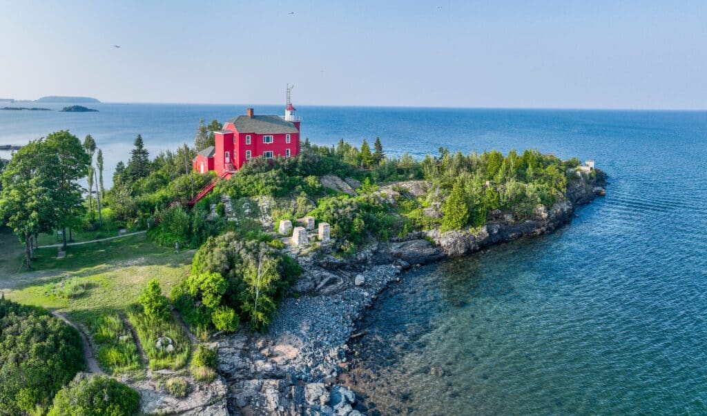 Standing guard over Lake Superior since 1853, Marquette Harbor Lighthouse has guided iron ore ships and weathered the wildest storms of Michigan’s Upper Peninsula.