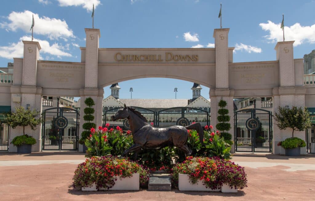 Louisville, Kentucky, USA, Horizontal photo of the Grand Entrance to the Kentucky Derby at Churchill Downs in Louisville Kentucky. Shown is a sculpture of a thoroughbred, horse.