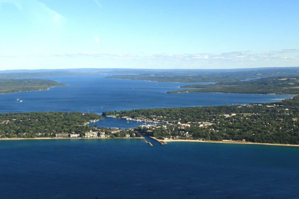 Aerial view of Lake Charlevoix, Michigan, a popular summer vacation destination.