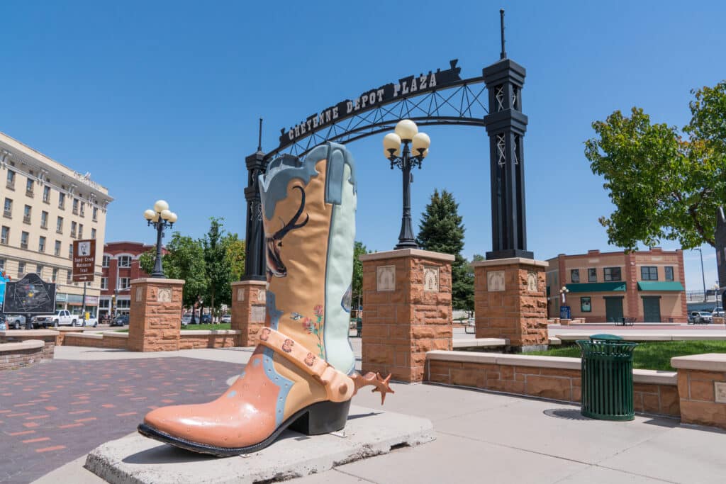 Large cowboy boot art sculpture outside in the historic Cheyenne Depot Park in downtown Cheyenne, Wyoming