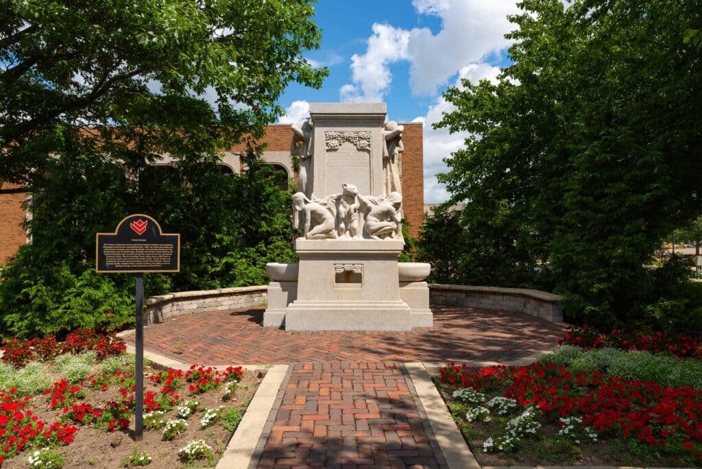 Bloomington, Illinois - United States: The Trotter Memorial Fountain by sculptor Lorado Taft, dedicated in 1911, on a sunny Summer morning in downtown Bloomington, Illinois.