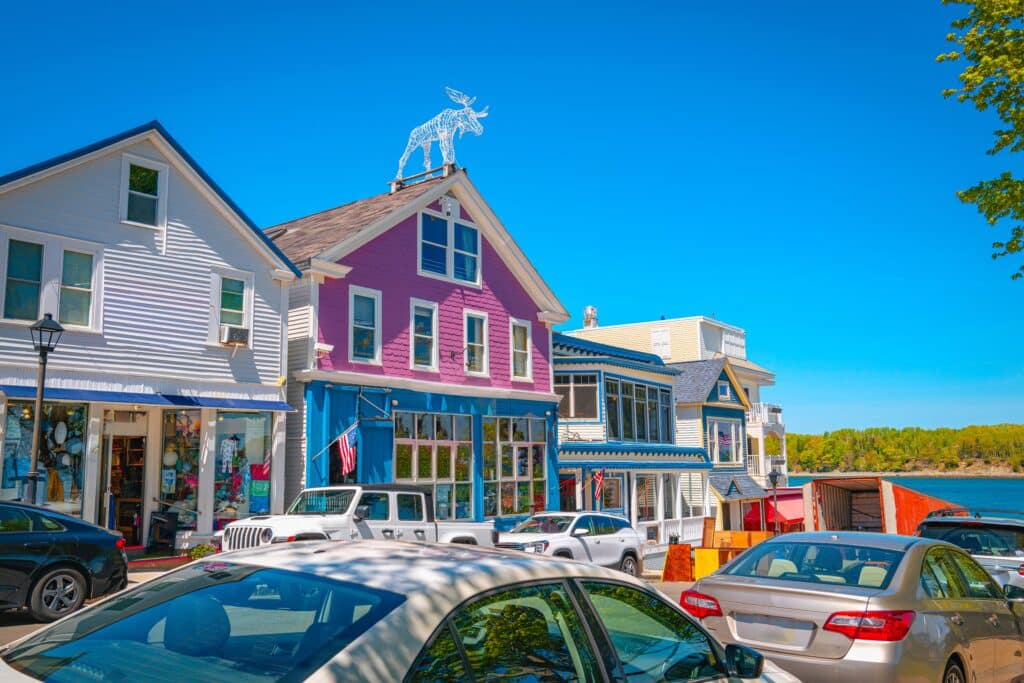 Bar Harbor skyline, colorful buildings, and street traffic in Maine, summer travel city landscape