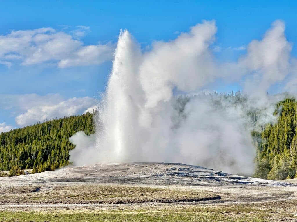 Old Faithful erupts, Yellowstone National Park, WY