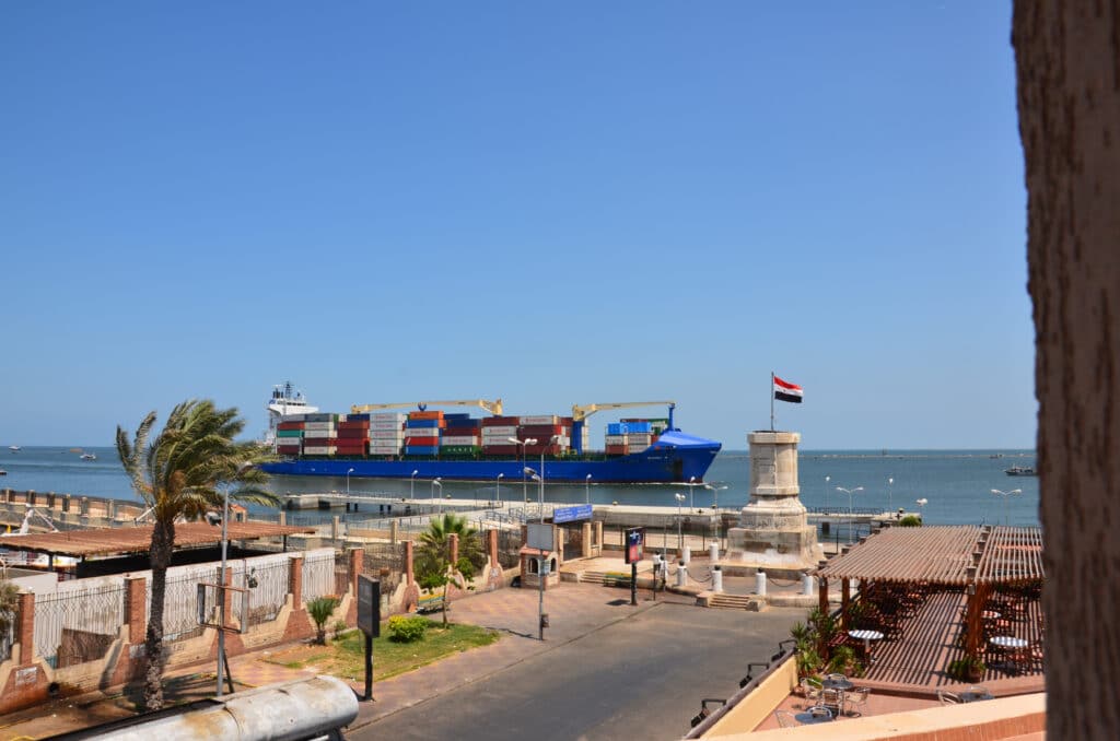 Portsaid / Egypt: cargo ships crossing the suezcanal in Egypt