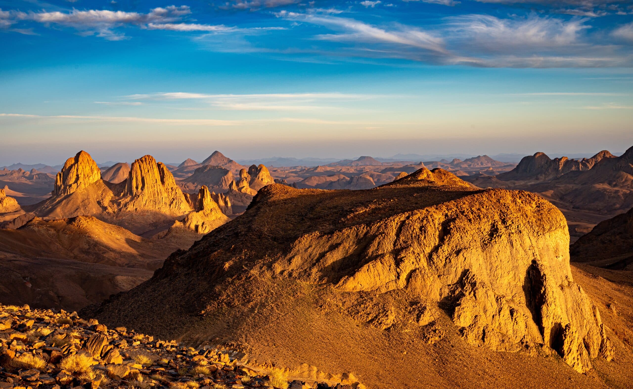 Hoggar landscape in the Sahara desert, Algeria. A view of the mountains and basalt organs that stand around the dirt road that leads to Assekrem.