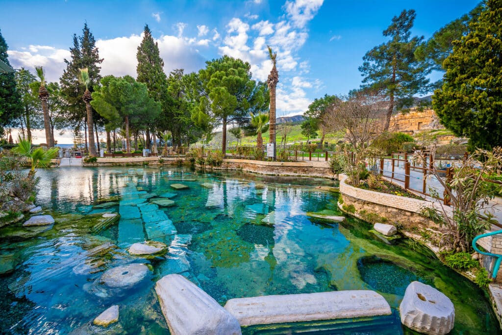 The Antique pool (Cleopatra's Bath) view in Pamukkale. It's a popular touristic destination during a Pamukkale visit