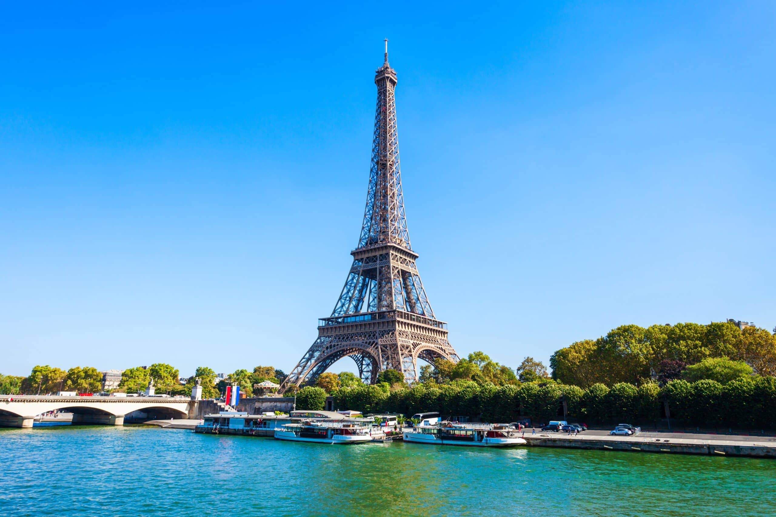 Eiffel Tower or Tour Eiffel is a wrought iron lattice tower on the Champ de Mars in Paris, France
