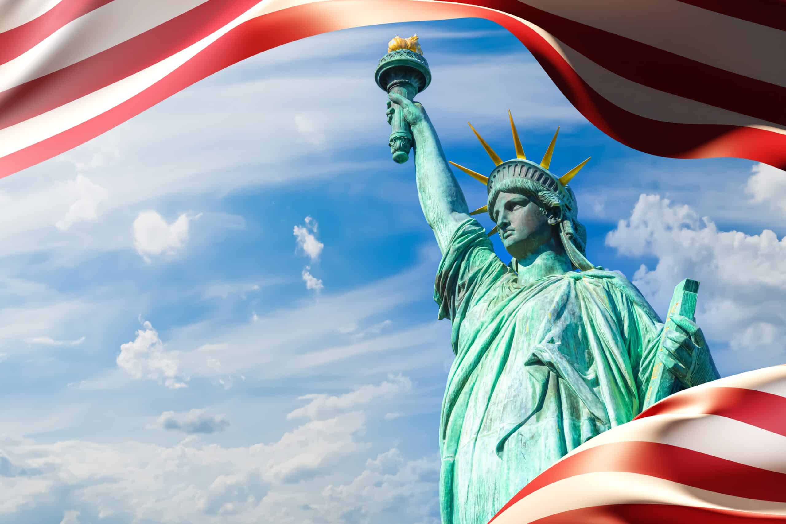 Statue of liberty. Symbol of American democracy. USA flag on sky background. US tourist attraction. Statue of liberty from New York. USA patriotic background. United states of America