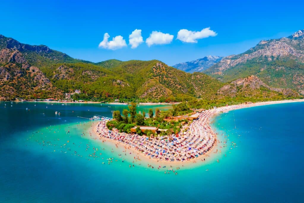 Blue Lagoon and Oludeniz beach aerial panoramic view. Oludeniz is a beach resort in the Fethiye district of Mugla Province, Turkey.