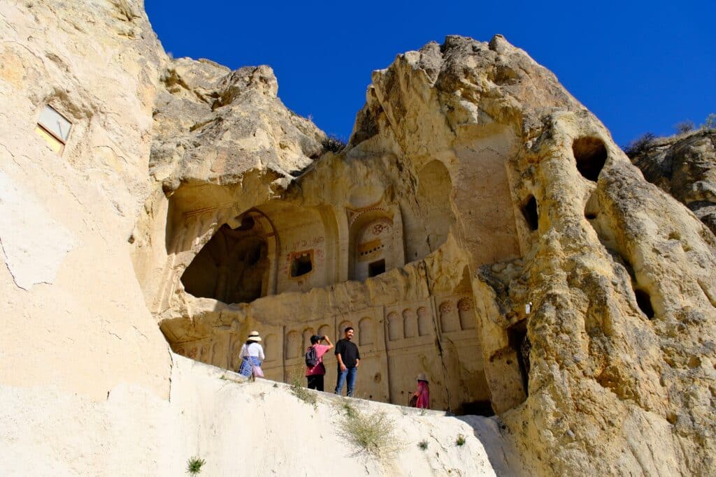 Cappadocia,Turkey: tourists at Dark Church in Göreme Open Air Museum