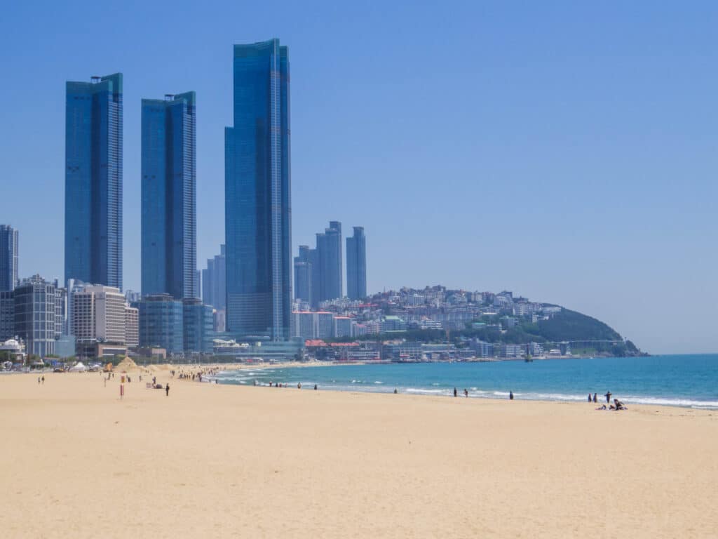 Haeundae Beach with skyscrapers and sandy shoreline in Busan