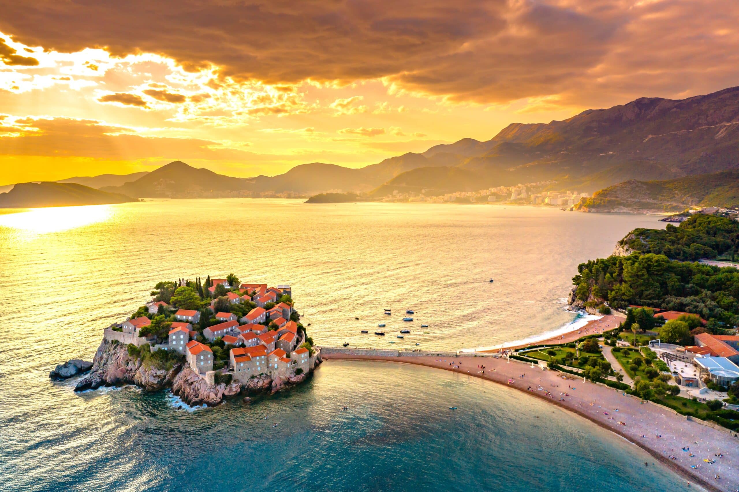 Old town and beach Sveti Stefan sea island, Budva, Montenegro, Europe