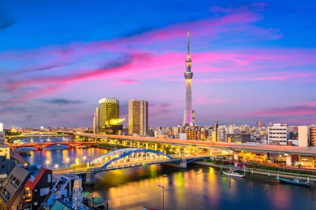 Tokyo Skytree at sunset with river reflections and skyline