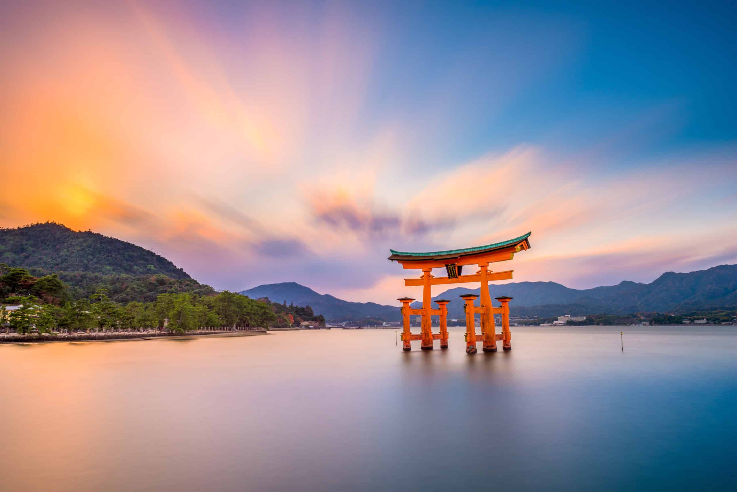 Floating torii gate of Miyajima photographed with a long exposure during sunset